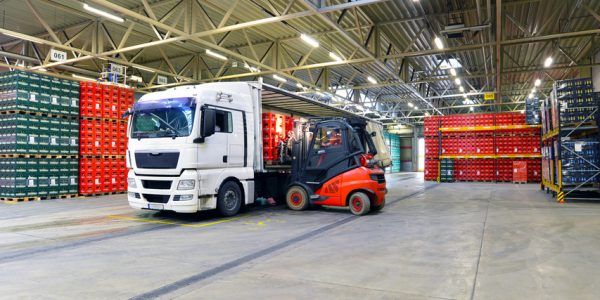 shipping - loading of a truck in a warehouse by forklift